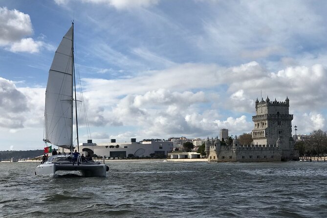 2H Tour on a Private Sailing Catamaran "Scarlett" up to 16 people - From the water: seeing Lisbon’s main monuments (without the crowd pressure)
