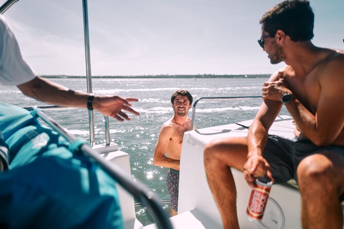 4 Hours Private Tour with Dives in Catamaran in Lisbon - Stop 2: Sailing the Lisbon bay and anchoring near the shoreline