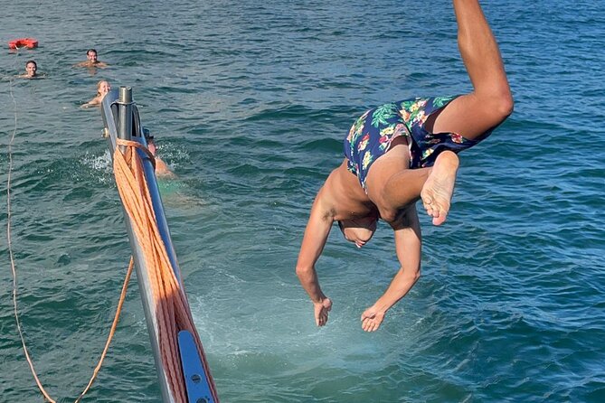 4 Hours Private Tour with Dives in Catamaran in Lisbon - Stop 5: Back to Doca de Belém and the 25th of April Bridge views