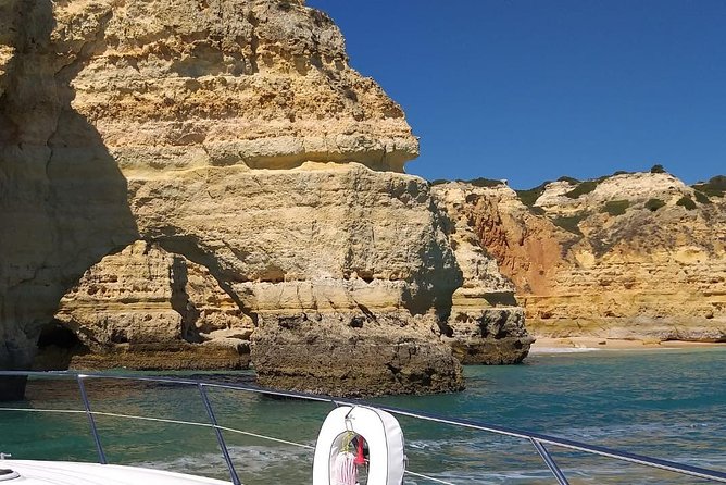 Afternoon Cruise Sunseeker Portofino 53 - Stop 2: Praia da Coelha near Sesmarias—calmer beach energy