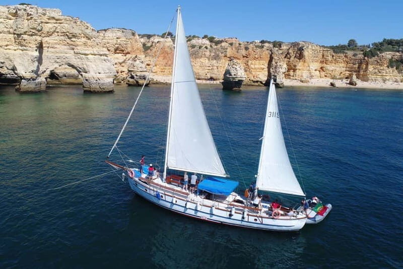 Albufeira: 6-Hour Boat Tour with BBQ and Drinks - Why the Dinghy Beach Stop Makes This Tour Feel Special