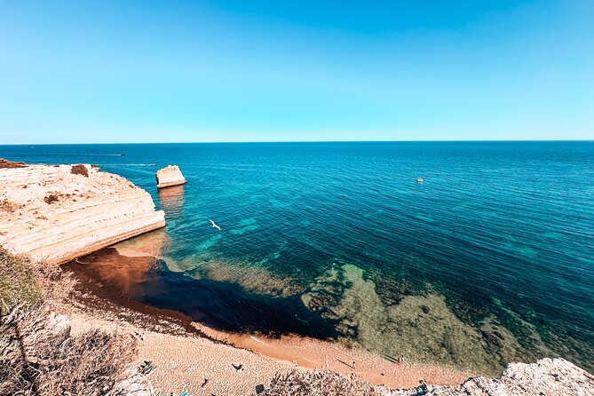 Albufeira: Benagil, Algar Seco, Marinha & 7 Hanging Valleys Tour - Stop 5: Praia da Marinha, cliff views, and sunset payoff
