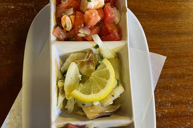 Albufeira Food Experience: Land & Sea Tapas w/ Wines - The guide experience: why names like Cody, Rostyslav, and Albert matter