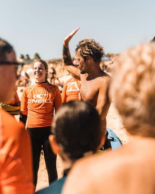 Albufeira: Learn to Surf in Chill Beach Vibes & Good Times - Your 2-hour lesson flow: warm-up, wave catching, and the stand-up moment