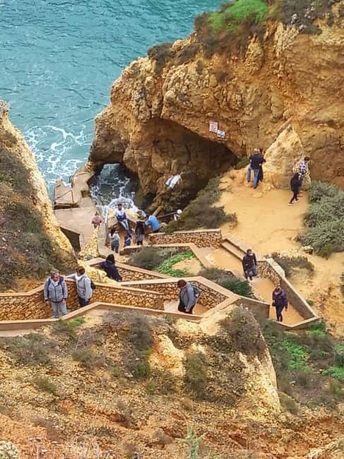 Algarve: Lagos, Ponta da Piedade and Sagres Private Tour - Marinha Beach finish: a fitting coastal end