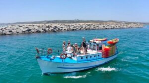 Alvor: Explore Caves Boat and Kayak Tour - The 1957 Frontino boat ride: comfort, bar, and real local color