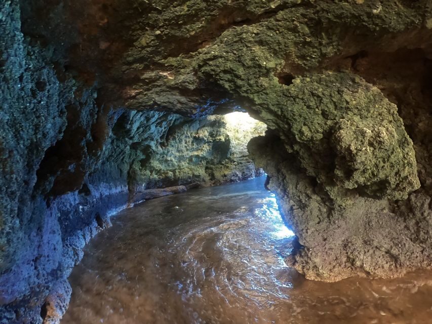 Alvor: Explore Caves Boat and Kayak Tour - The cave swim stop: where the tour turns from scenic to energizing