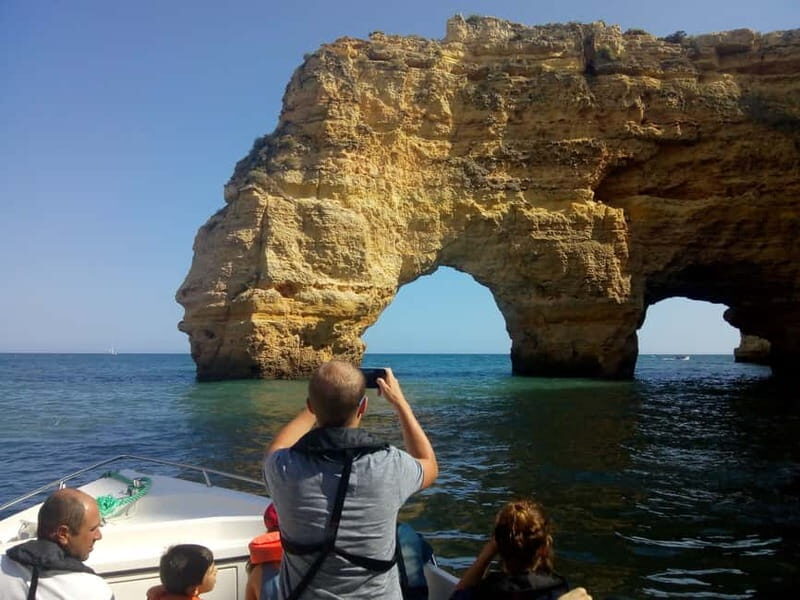 Armação de Pêra: Benagil and 10 Best Caves Guided Boat Tour - Aurora Boat Trips: small-group feel, open-deck views, and Henry’s style