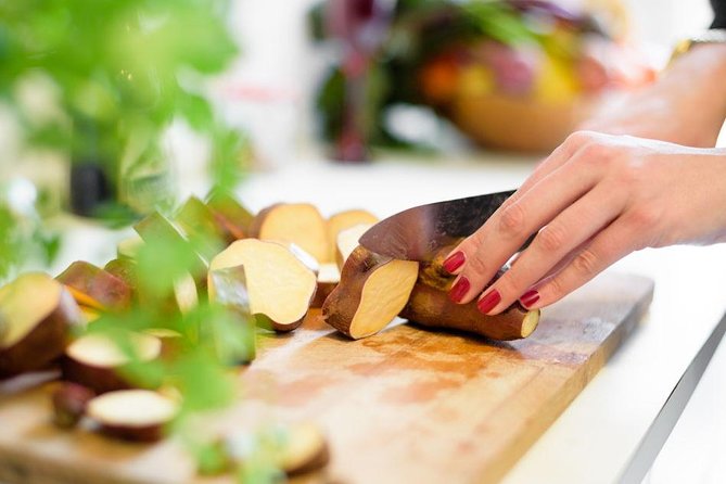 Authentic Portuguese Cooking Class and Dinner in a Lisbon Home - The cod fish main: hands-on cooking at the table, plus wine region talk