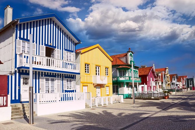 Aveiro and Costa Nova: Private Tour with Moliceiro Cruise Half Day - Moliceiro cruise on the Ria de Aveiro canals: how the ride really works