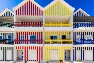 Aveiro and Costa Nova: Private Tour with Moliceiro Cruise Half Day - Costa Nova do Prado: striped fishermen huts and coastal calm