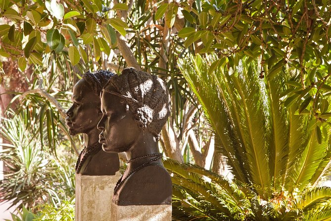 Belém District and the Salazar Dictatorship Legacy - Private Walking Tour - Praca do Imperio: the 1940 Exhibition hub in flowerbeds and fountains