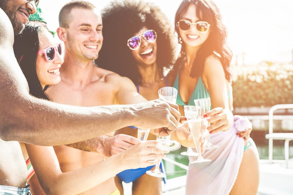 Boat Party to the Beach with Swimming Stops, DJ and Open Bar - Key Things to Know Before You Go