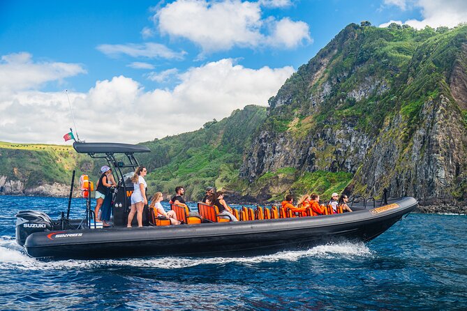 Boat Tour: Caves & Cliffs Tour on the Wild North Coast - Santa Iria Port under the cliffs: quiet water and sea-level calm