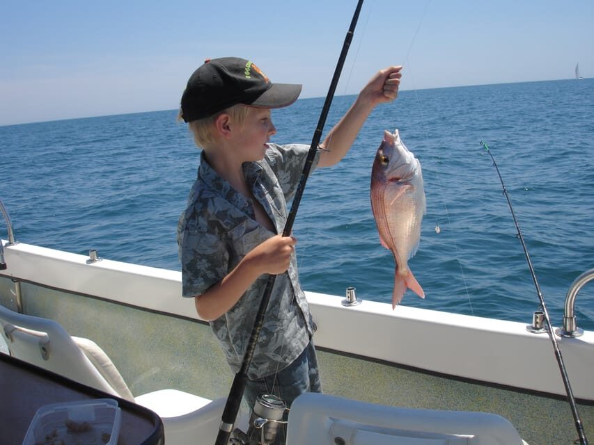Bottom Fishing Lagos - Views Along the Way: Cliffs, Caves, and Dolphins