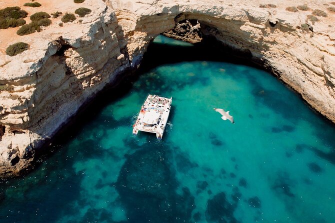 Catamaran Cruise: Caves and Coastline to Benagil - Champagne, Wi‑Fi, and music: what the included extras really do