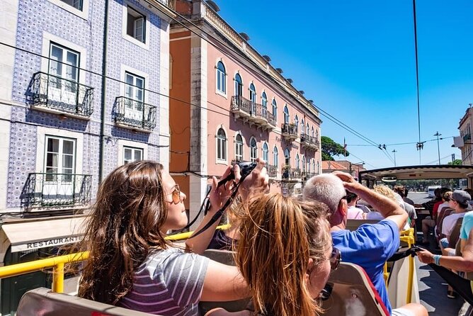 City Sightseeing Lisbon Hop-On Hop-Off Bus Tour & Bookable Extras - Audio guide in 13 languages: helpful, but not always consistent