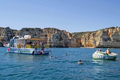 Coastal Tour 2H30M / Lagos / Grottos / Aqua Trampoline - Cruising Past Lagos: Forts, Cais Areas, and Famous Beaches