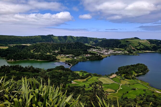 Cruise Travellers: Sete Cidades Volcano, The Blue & Green Lake - Stop 4: Miradouro da Ponta do Escalvado for cliffs and black rocks