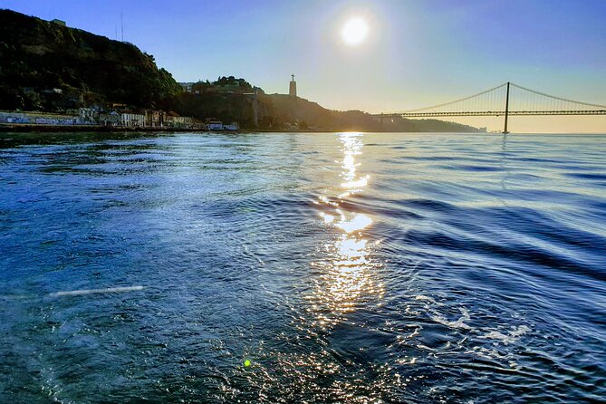 Daytime/Lisbon Sunset Boat with history and wine (small group) - “History” on a boat: what you learn without it feeling like homework