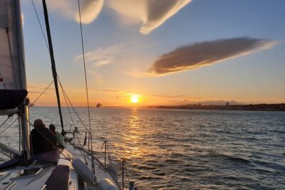 Daytime/Lisbon Sunset Boat with history and wine (small group) - The wine setup: Vinho verde, water, and a sweet Portuguese surprise