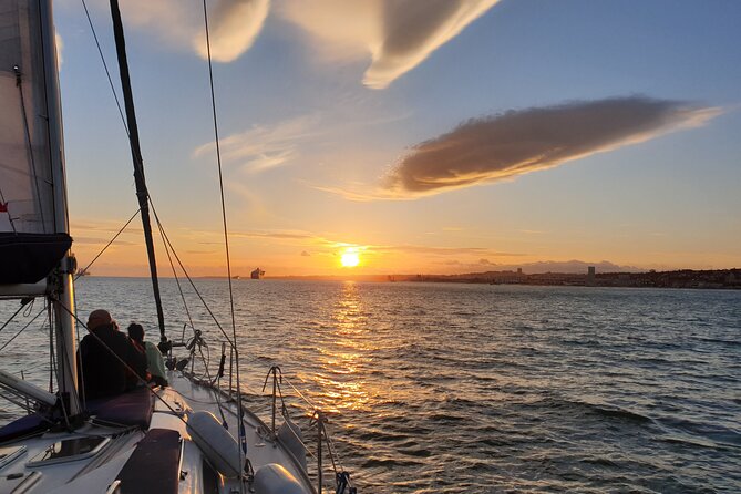 Daytime/Lisbon Sunset Boat with history and wine (small group) - The wine setup: Vinho verde, water, and a sweet Portuguese surprise