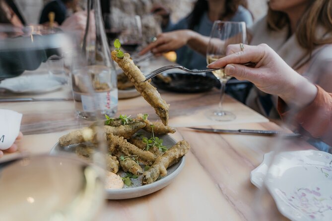 Exclusive Lisbon Progressive Dinner & Wine Tour - A Obra on Lisbon’s Green Street: octopus rice and orange wine
