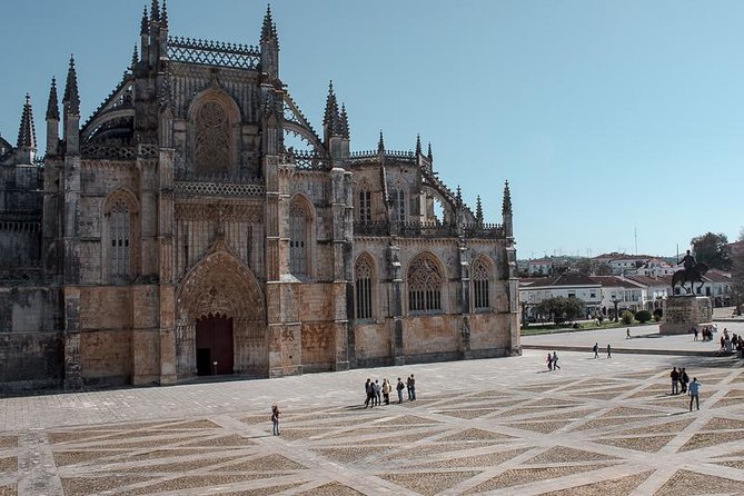 Faith and Heritage: Fátima, Batalha, Nazaré, Óbidos from Lisbon - Óbidos Walled Village Walk: Cobblestones, Shopping, and Ginjinha