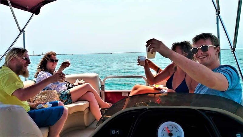 Faro: Sunset 1 hour Ria Formosa Boat Tour - Sunset timing and the best way to dress and bring snacks