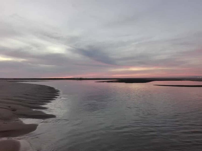 Faro: Sunset 1 hour Ria Formosa Boat Tour - Guide commentary in four languages: what makes it feel personal