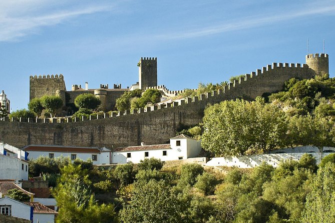 Fátima, Batalha, Nazaré and Óbidos Private Tour - Stop 4: Óbidos medieval walk, castle views, and ginja de Óbidos