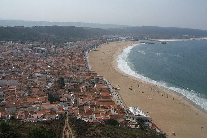 Fátima, Batalha, Nazaré and Óbidos Small Group Tour from Lisbon - Nazaré village time: seafood lunch and the real fishing-town atmosphere