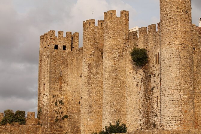 Fátima, Batalha, Nazaré and Óbidos Small Group Tour from Lisbon - Óbidos: medieval walls, white houses, and a sweet cherry liqueur