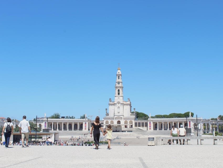 Fátima: Sanctuary and Aljustrel Village, Private Guided Tour - Meeting at the Base of the Tall Metal Cross Inside the Sanctuary