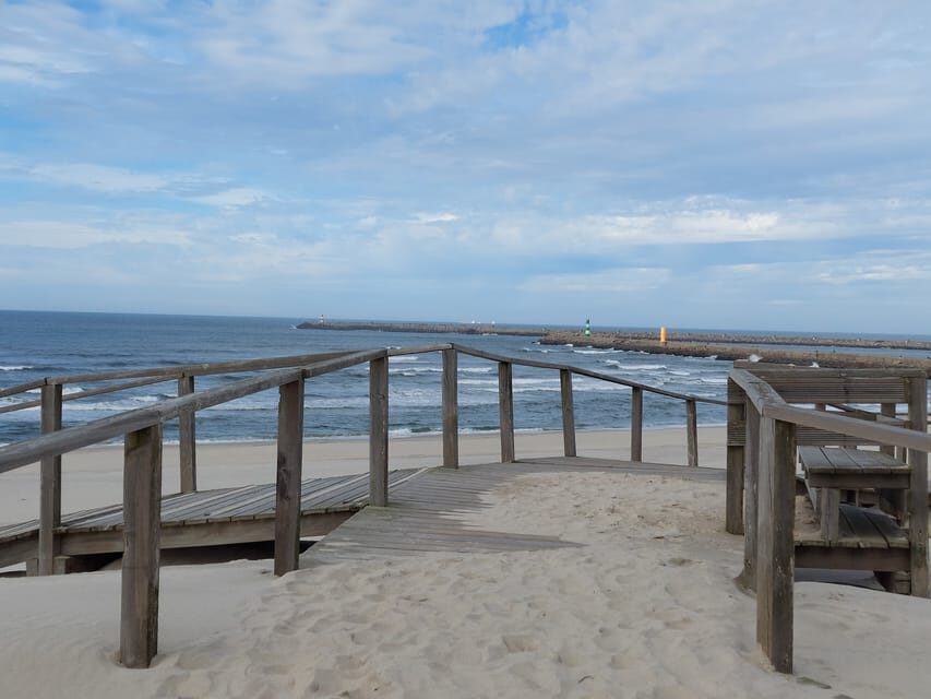 From Aveiro/Ilhavo: Barra, Costa Nova, and Vista Alegre Tour - Costa Nova stroll: the striped wooden houses and a pastry stop