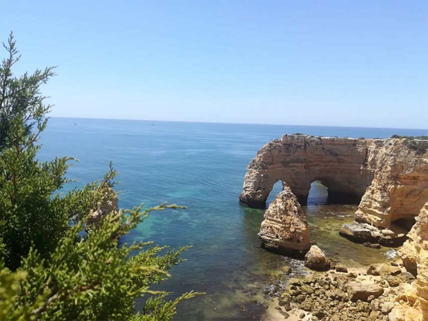 From Faro: Benagil Cliffs Hiking & 4 Treasures Experience - Senhora da Rocha and Praia Nova: the chapel, the tunnel, and the beach breathing room