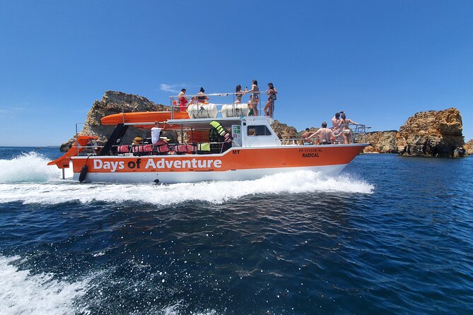 From Lagos: Kayak Tour of Ponta da Piedade Caves on Catamaran - Swim Break, Boat Slide, and the Coastal Cruise Home
