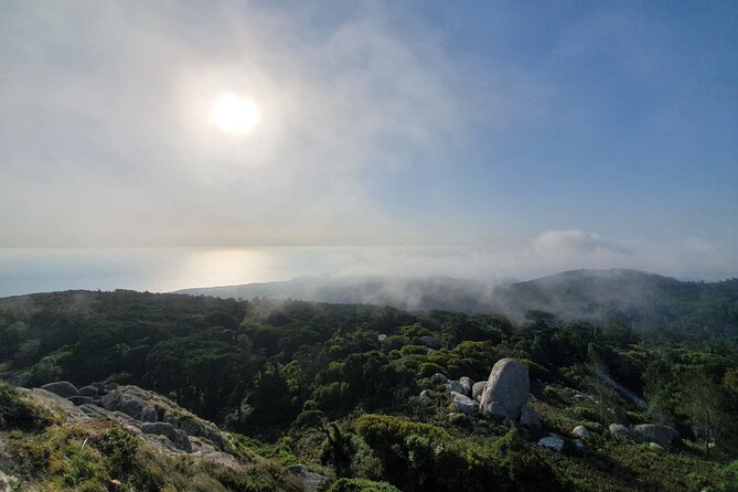 From Lisboa: Sintra, Cabo da Roca & Cascais Private Full Day Tour - Guincho Beach and the Sintra mountains contrast