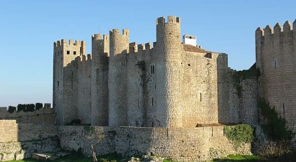 From Lisbon: Fátima, Batalha, Nazaré and Óbidos Day Tour - Nazaré: Atlantic cliffs, beach life, and the legend viewpoint