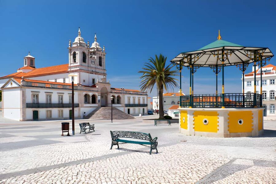 From Lisbon: Fatima, Nazaré, and Obidos Small Group Tour - Óbidos: medieval walls, Santa Maria, and the best ginjinha stop