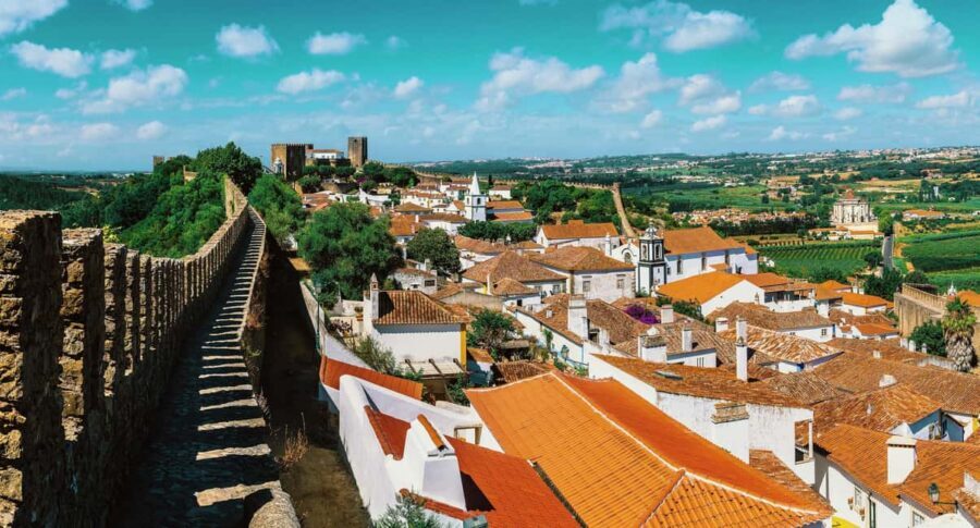 From Lisbon: Nazare Big Waves & Óbidos Small Group Tour - Sítio and local legends: what to look for beyond the postcard