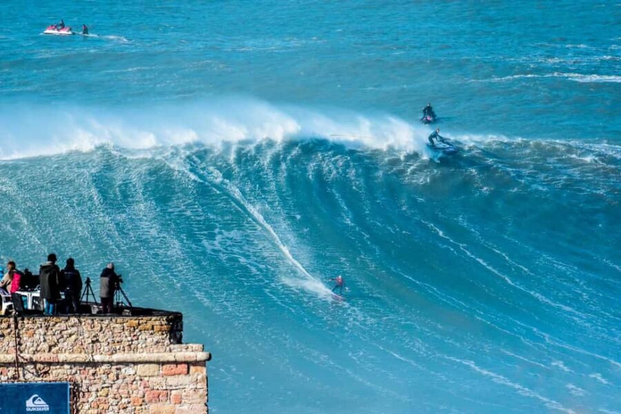 From Lisbon: Nazare Big Waves & Óbidos Small Group Tour - Nazaré lighthouse to beach: seeing the Atlantic’s power up close