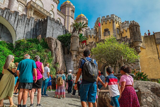 From Lisbon: Small Group to Pena Palace, Nazaré & Fátima - The Ride Back to Lisbon: Iconic Squares and Panoramic Views