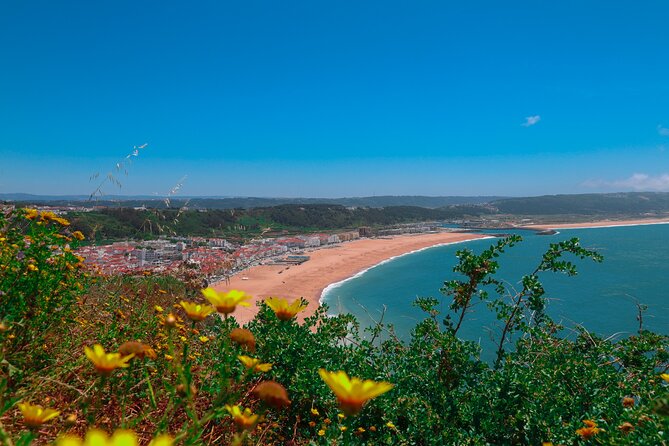 From Lisbon: Small Group to Pena Palace, Nazaré & Fátima - From the Living Tours Lisbon Office: Where the Day Begins