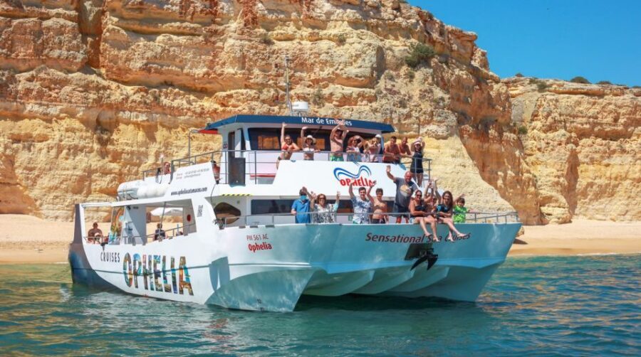From Portimão: Catamaran Cruise to Benagil Caves with BBQ - Ferragudo pass-by: the castle silhouette you’ll remember