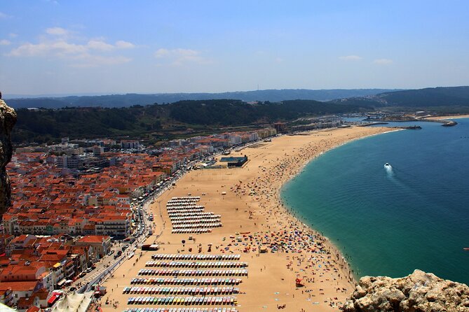 From Porto ↔ Lisbon with up to 4 stops : Aveiro, Nazaré, Óbidos - A Porto–Lisbon Transfer That Feels Like a Day Trip