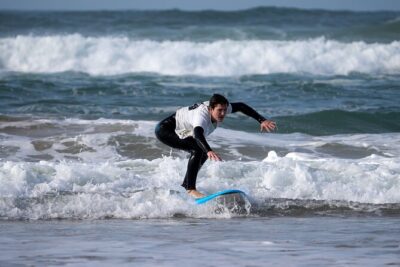 Group Surf Lesson in Costa da Caparica - How The Lesson Flows: From Warm-Up to Stand-Up