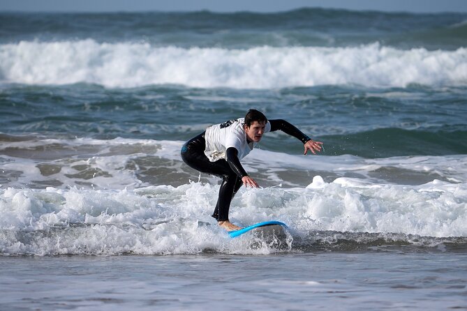 Group Surf Lesson in Costa da Caparica - How The Lesson Flows: From Warm-Up to Stand-Up
