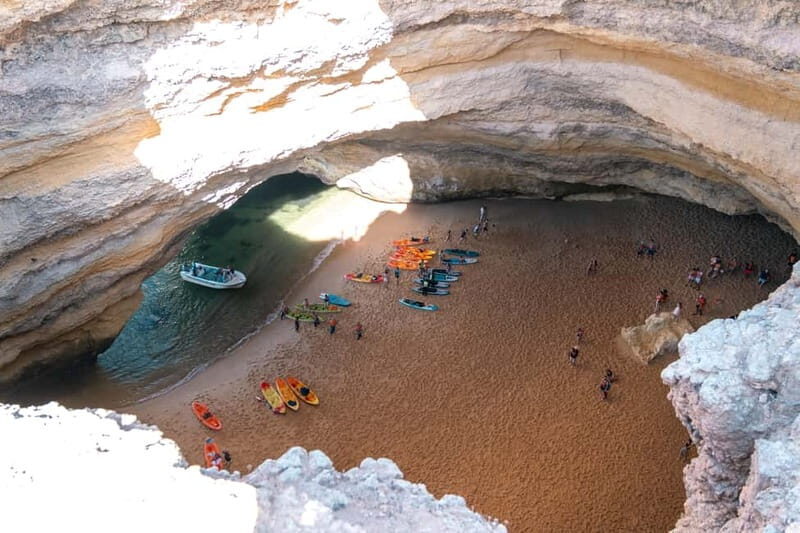 Guided hiking tour on the Seven Hanging Valleys Trail - Carvalho Beach and the Limestone Tunnel Moment