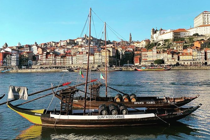 Half-day small group tour of Porto city with wine tasting - Livraria Lello and Mercado do Bolhão: books, local life, and snacks